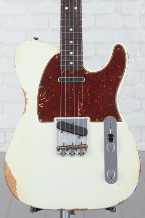 Photo of Fender Custom Shop Limited-edition '64 Telecaster Relic Electric Guitar - Aged Olympic White