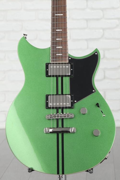 Black and store green electric guitar