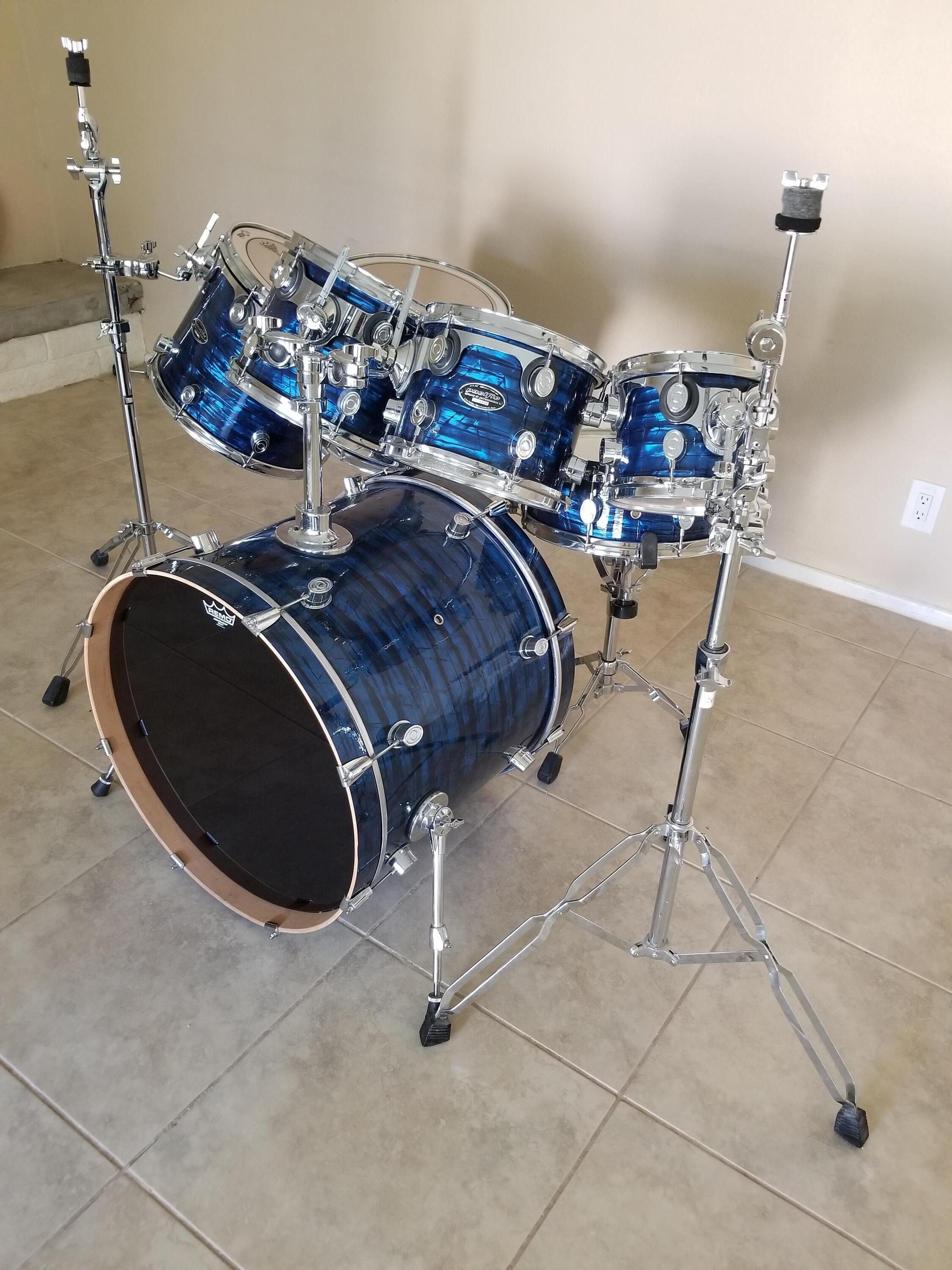 Used PDP by DW 7-piece CX series drum set. Includes extras. Updated