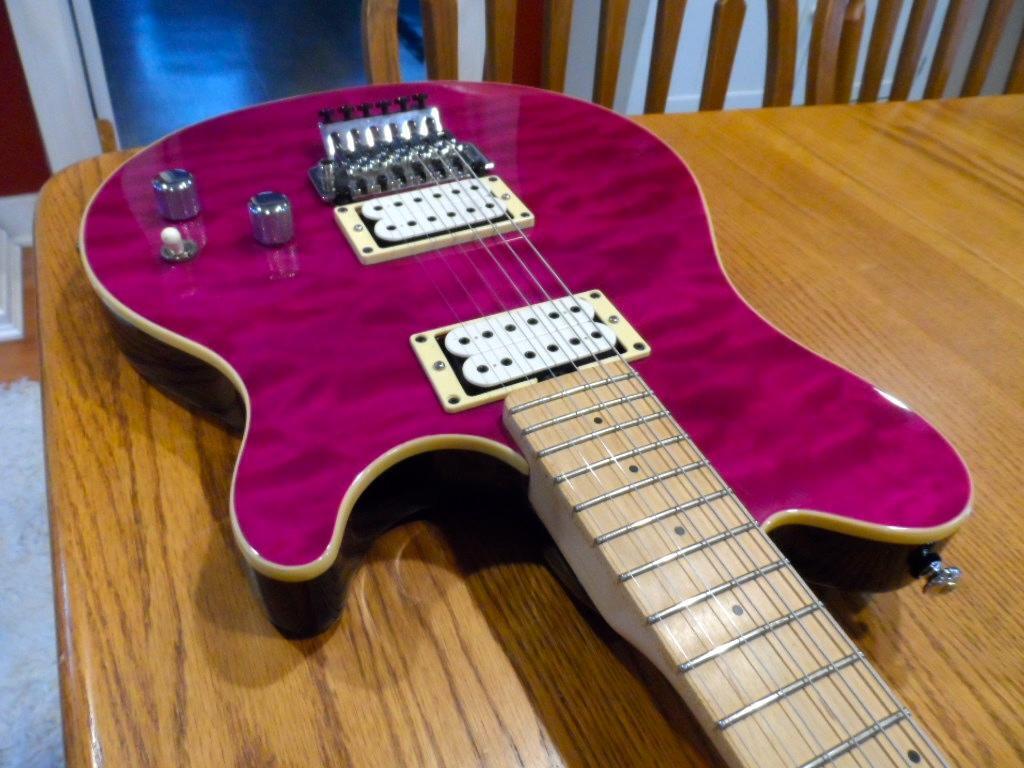 Used Sterling by Ernie Ball Music Man AX40 AX-40 with D DiMarzio Pickups  Trans Transparent Purple Pink Quilt Curly Flame Top Basswood Body  Translucent