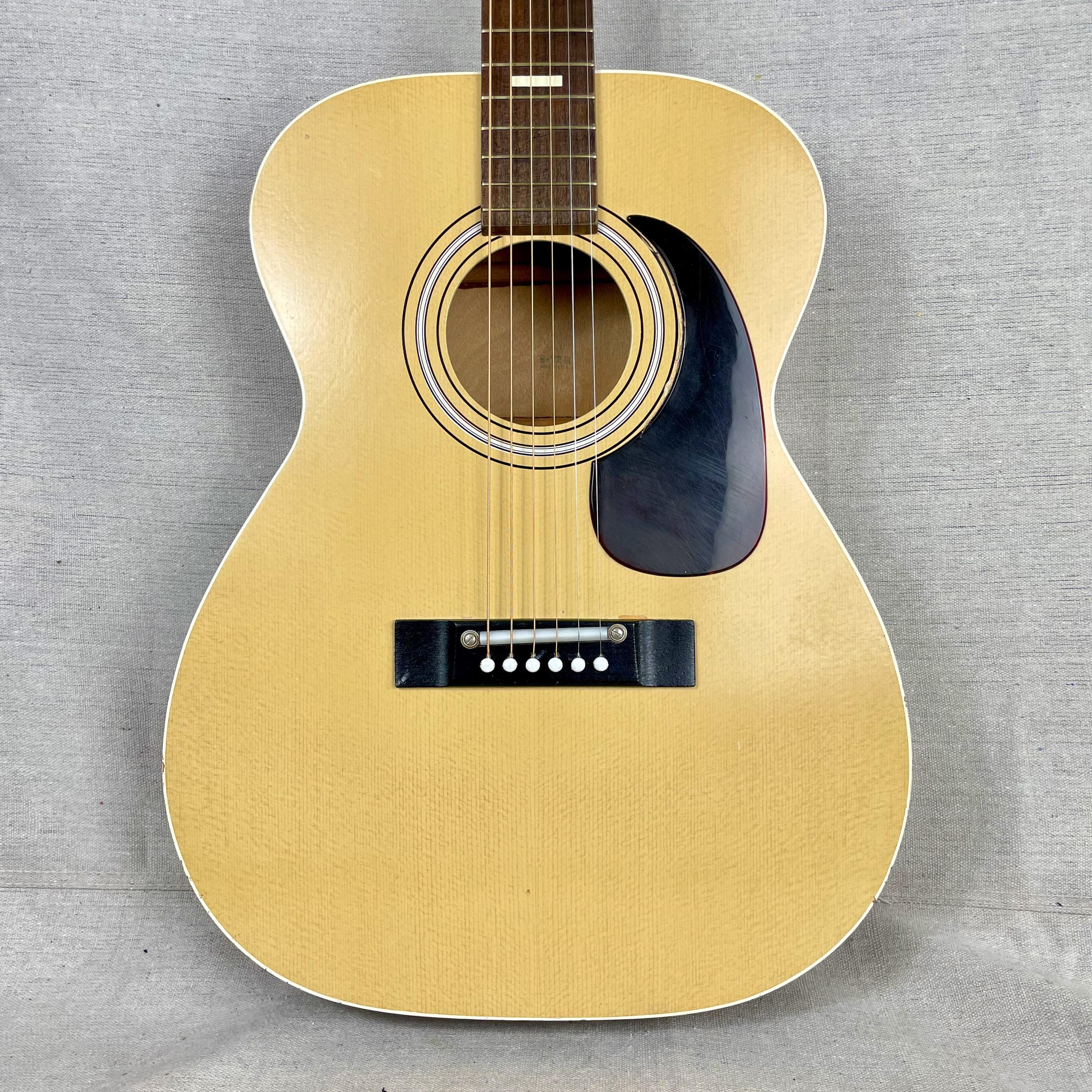 Harmony deals acoustic guitar