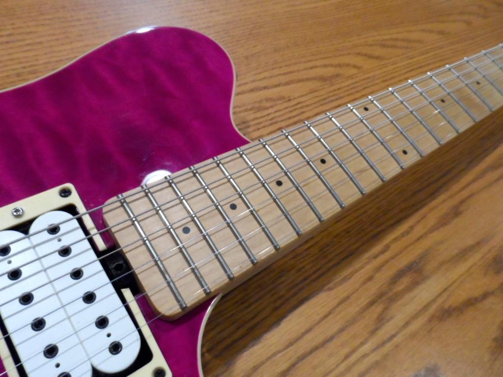 Used Sterling by Ernie Ball Music Man AX40 AX-40 with D DiMarzio Pickups  Trans Transparent Purple Pink Quilt Curly Flame Top Basswood Body  Translucent