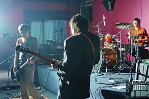 A band recording their sound check