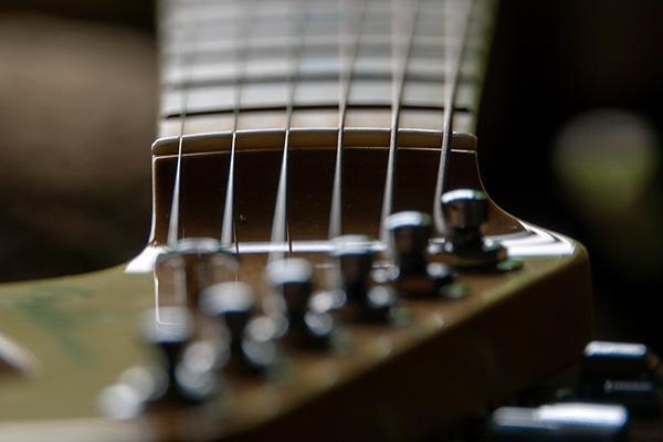 Pictured here: electric guitar anatomy with electric guitar parts names.