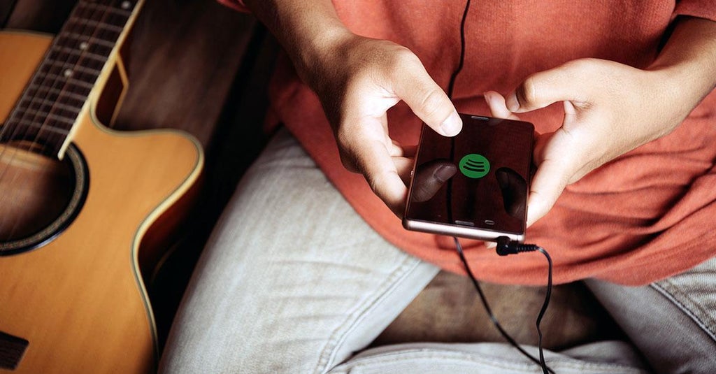 How to Get Your Music On Spotify, Apple Music, And More Using TuneCore