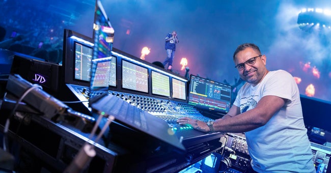 Burton Ishmael Operating Live Sound Console