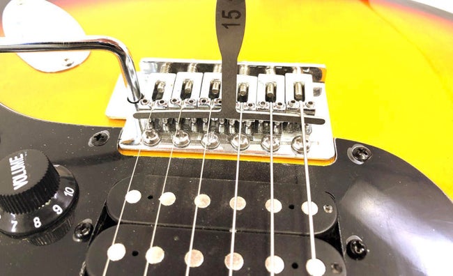 Adjusting-Bridge-How-to-Set-Up-a-Guitar-the-Sweetwater-Way-Advice-from-Our-Luthiers