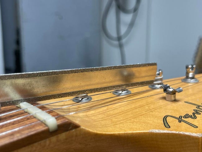 Guitar-String-Over-Nut-to-Tuning-Peg-How-to-Set-Up-a-Guitar-the-Sweetwater-Way-Advice-from-Our-Luthiers