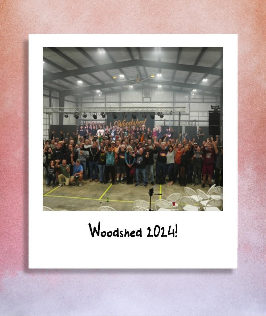 A polaroid of the group of attendees at The Woodshed 2024.