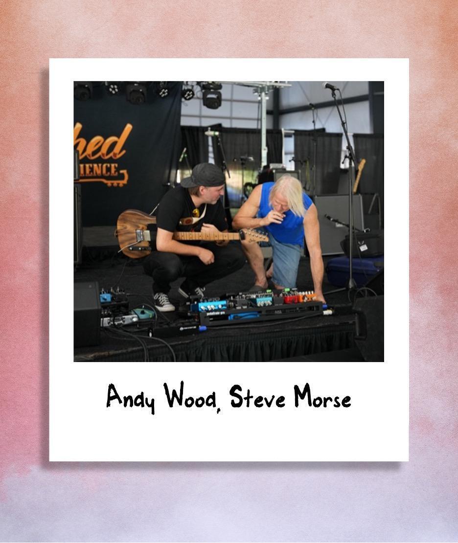 A polaroid of Andy Wood and Steve Morse kneeling in front of a pedalboard at The Woodshed 2024.