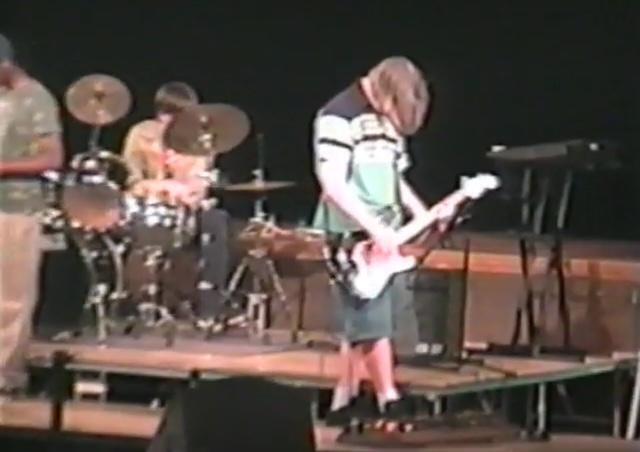 Fluff onstage with his homemade pedalboard
