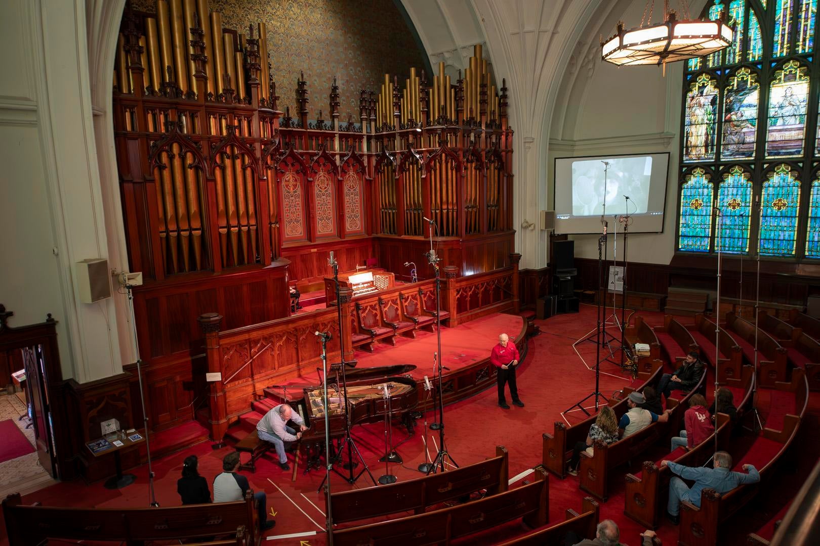 Performing maintenance on the historic 1905 Starr piano