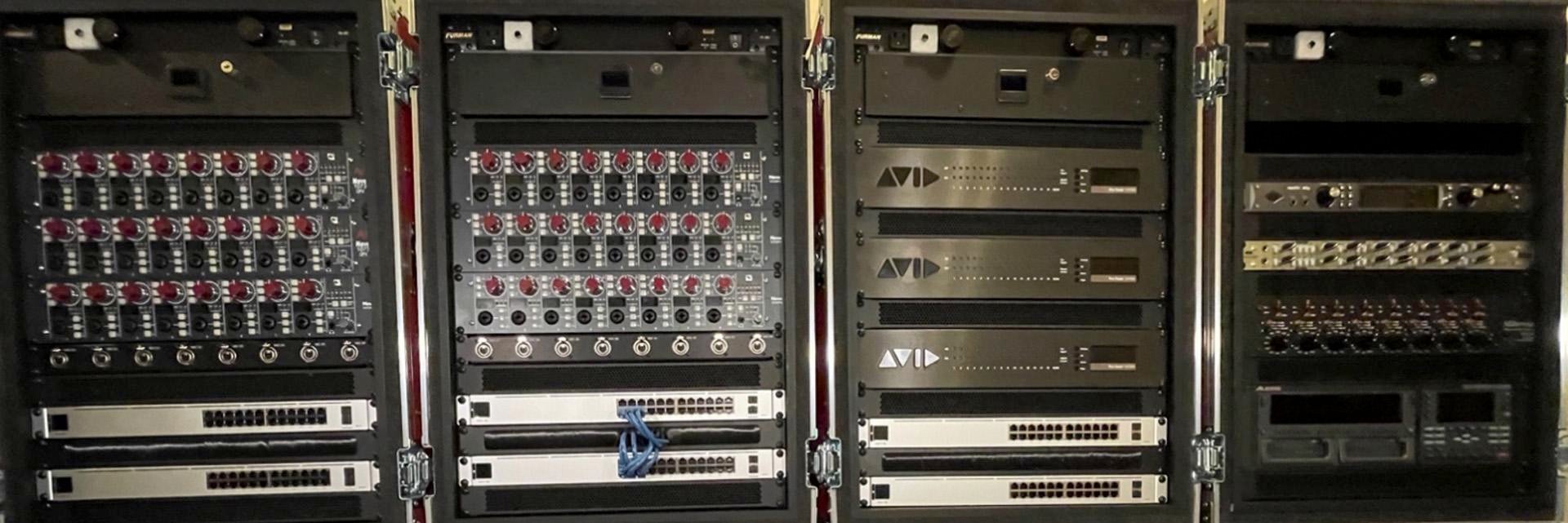 The four primary racks of the LCS with racks 1–2 at the recording location and racks 3–4 at the control/mix location