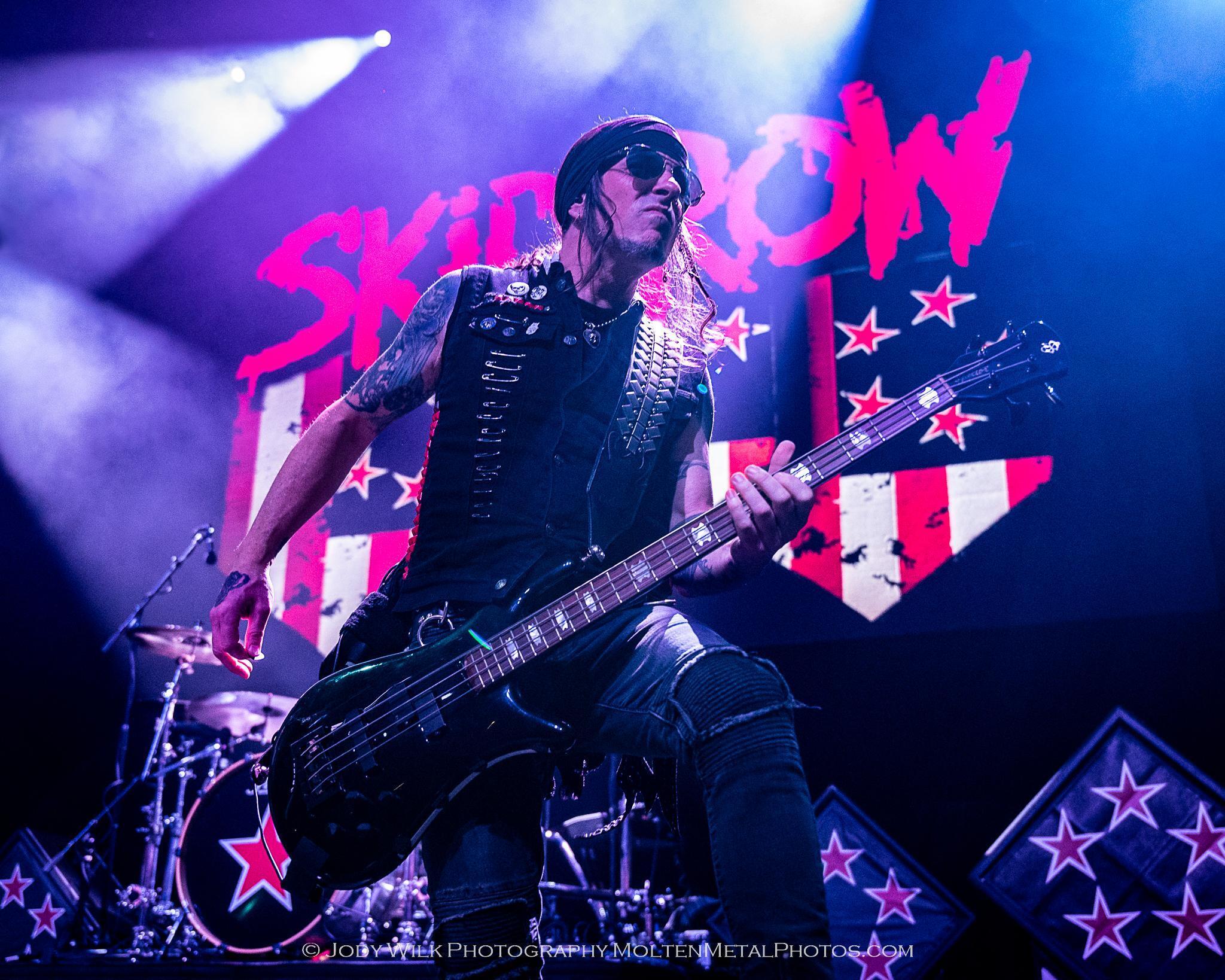 Rachel Bolan playing bass for Skid Row