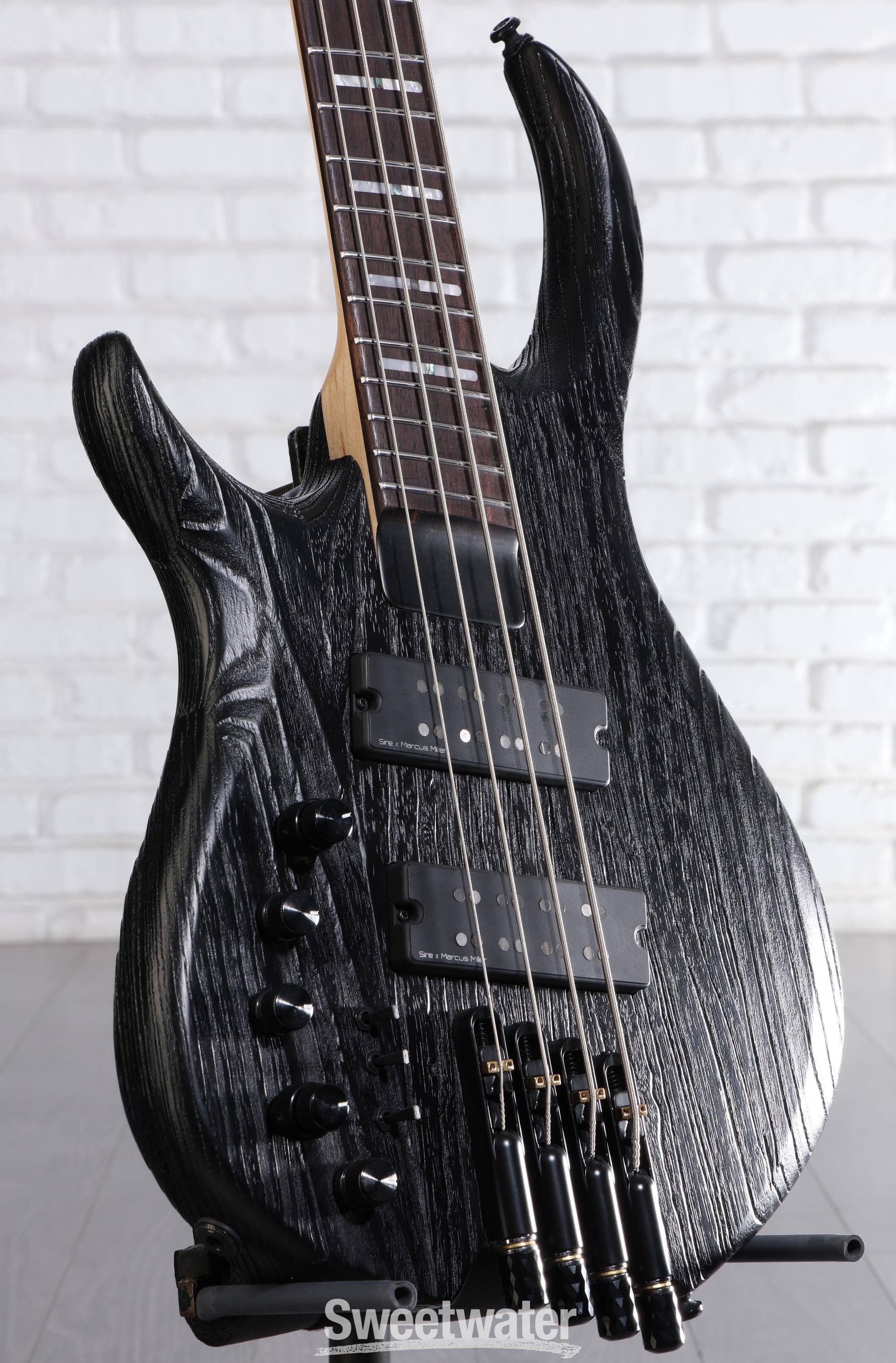 Photo of Sire Marcus Miller M6 4-string Headless Left-handed Bass Guitar - Black Satin
