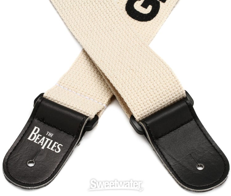 The guitar straps worn by The Beatles in Get Back