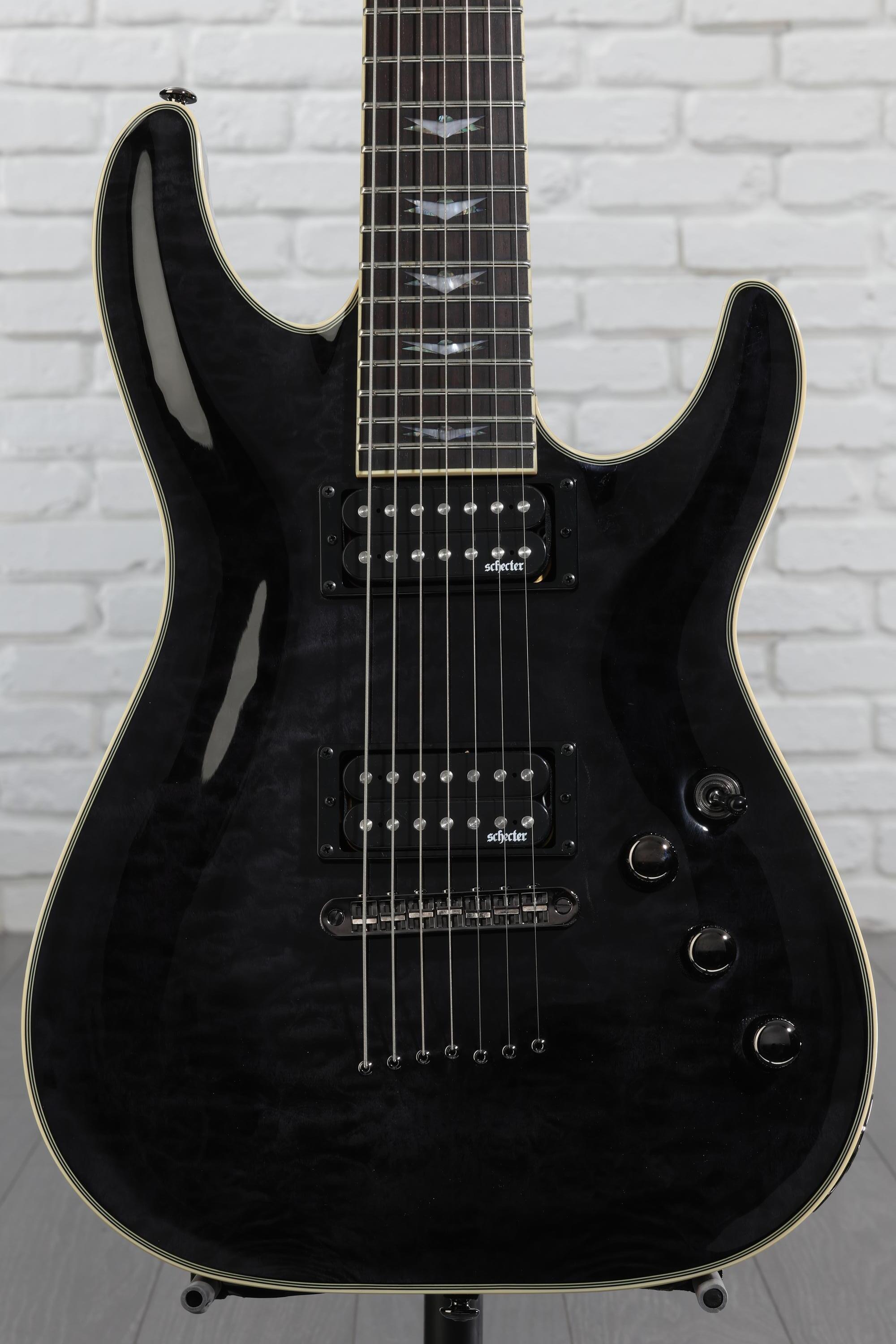 Schecter Omen Extreme-7 Electric Guitar - See Thru Black Reviews