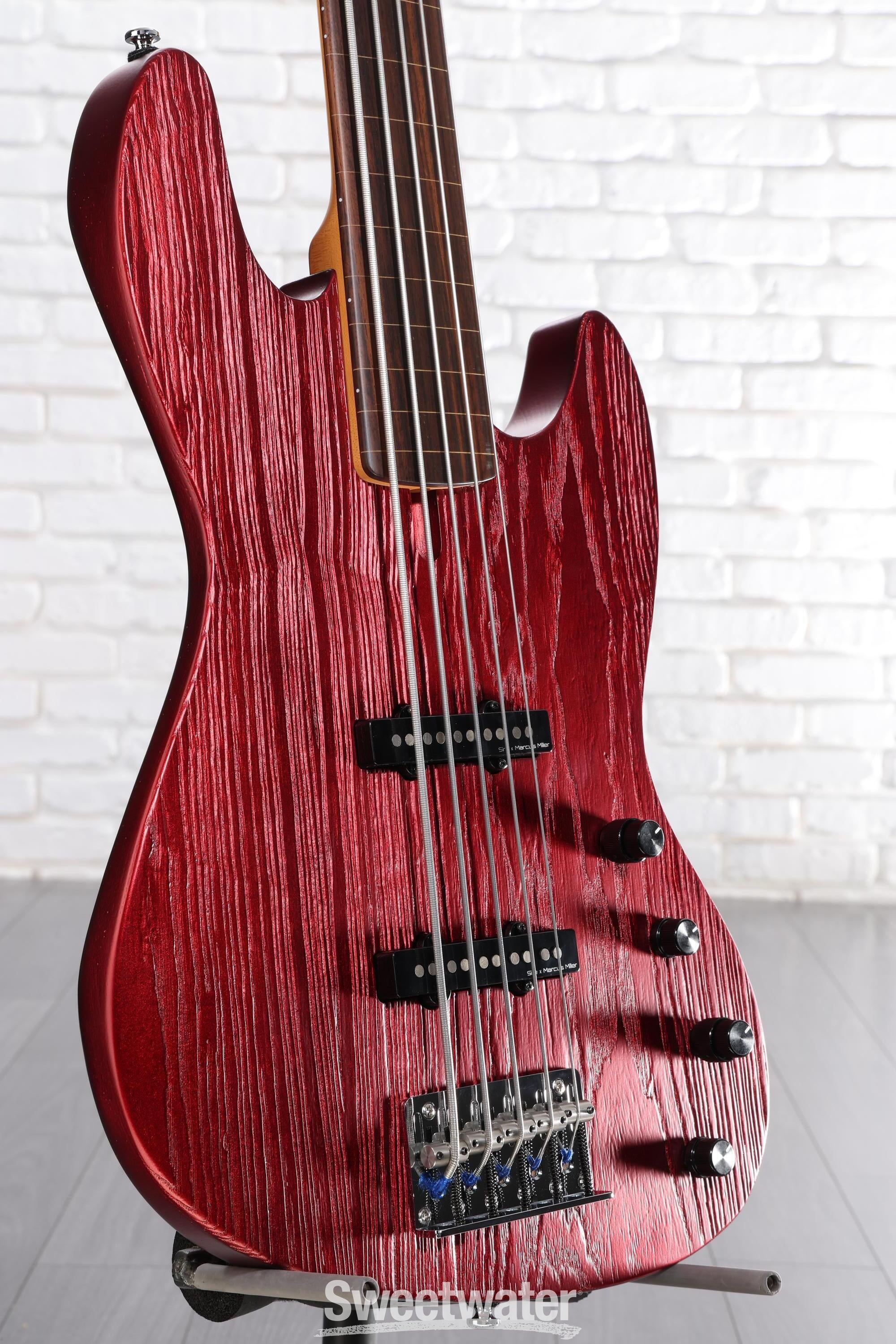Photo of Sire Marcus Miller V6 5-string Fretless Electric Bass Guitar - Candy Apple Red