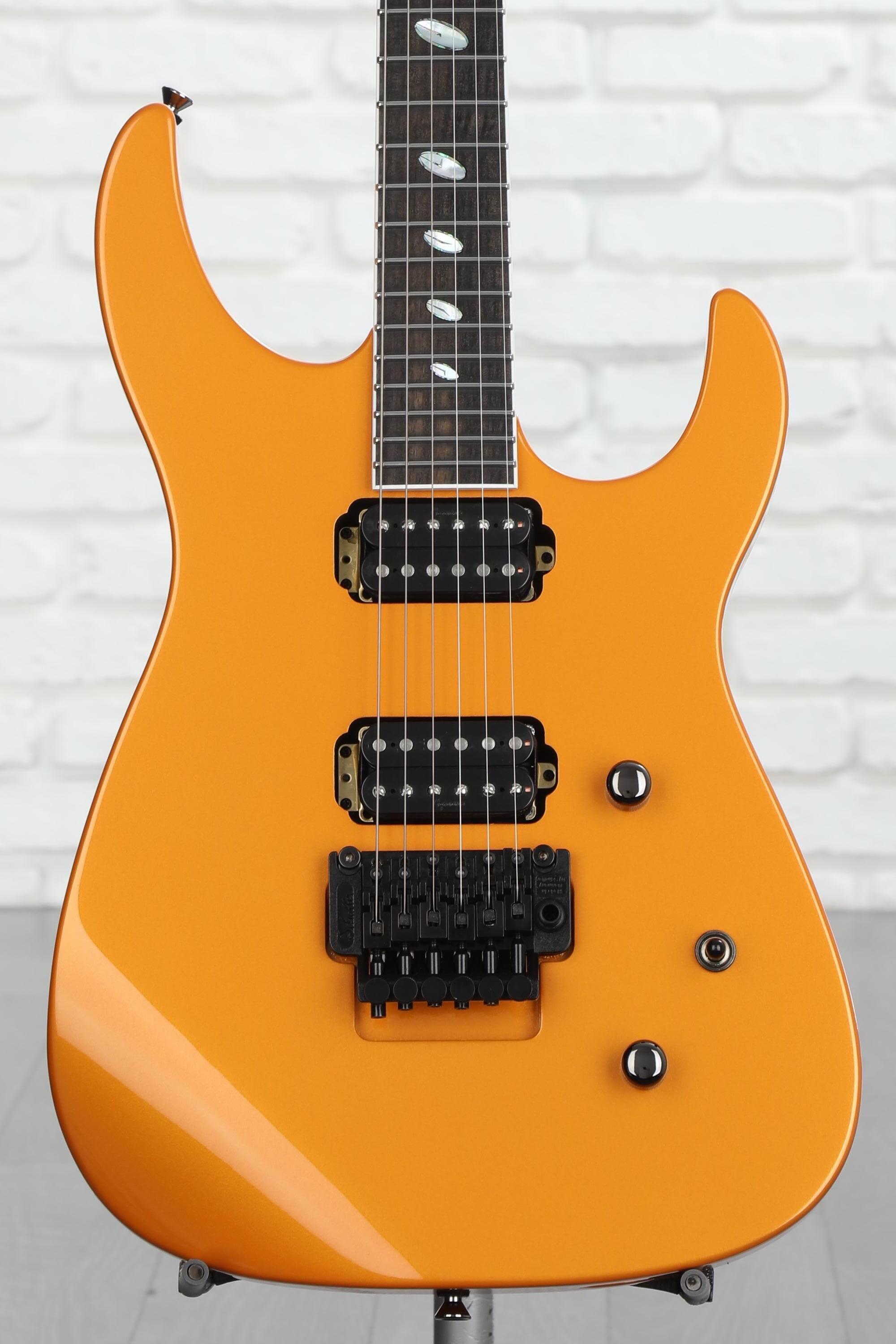Orange and black electric guitar hotsell