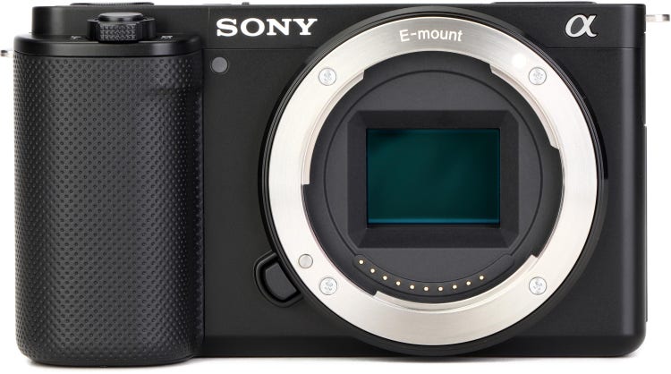 Sony Alpha ZV-E10 Mirrorless Digital Camera with Wireless Shooting Grip Tripod and SD Card - Body Only