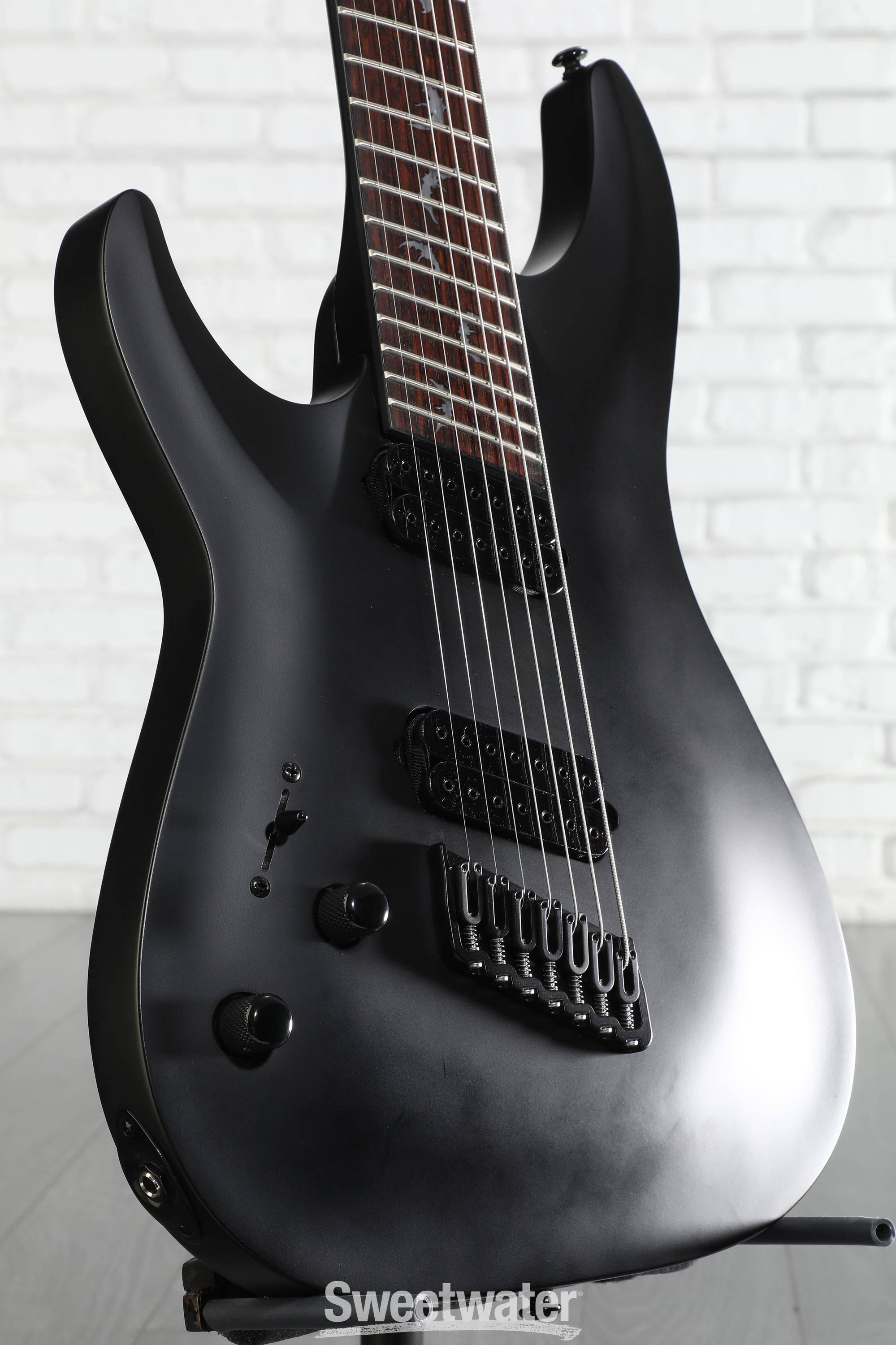 Photo of Schecter Damien-7 Multiscale Left-handed 7-string Electric Guitar - Satin Black