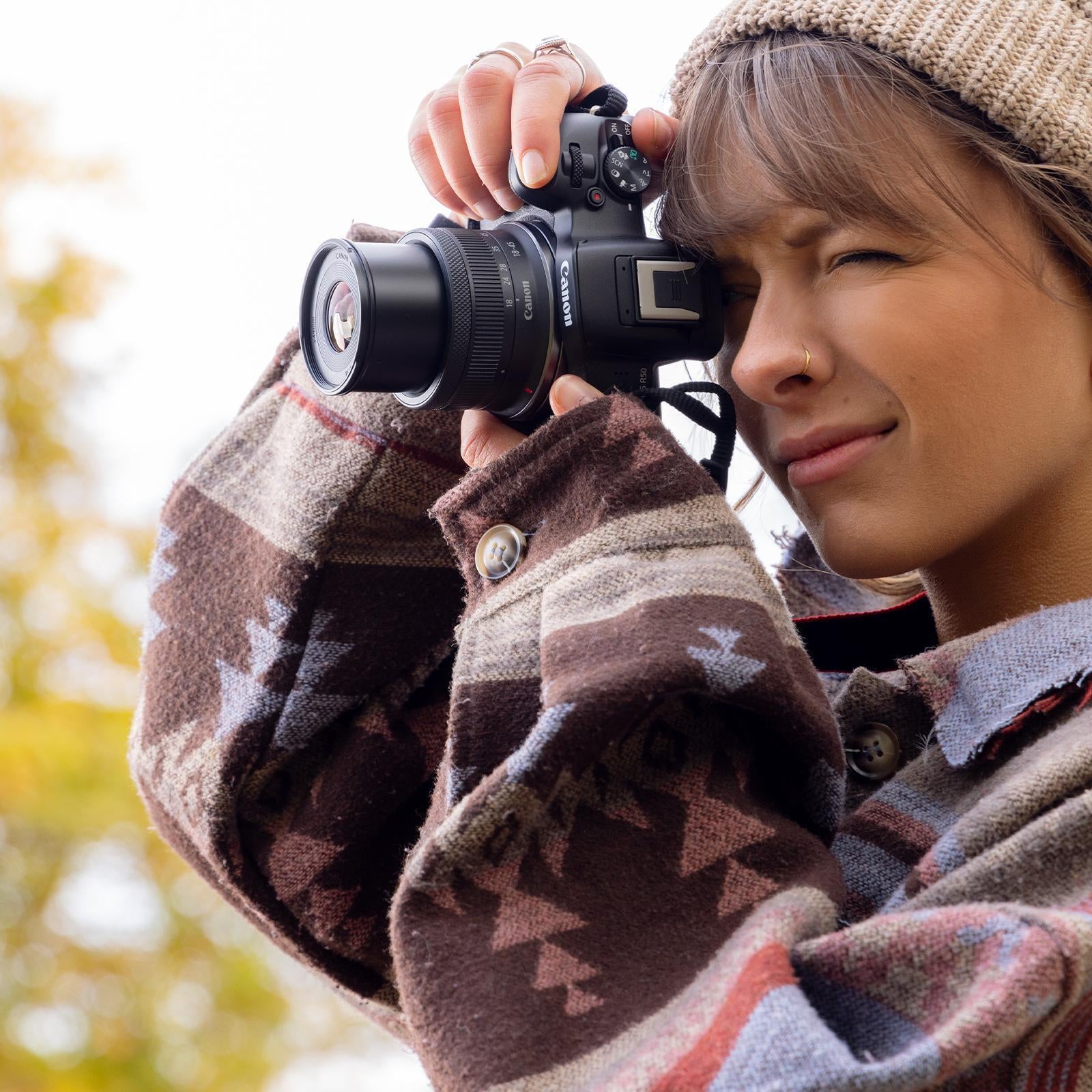 Person taking a picture with a camera